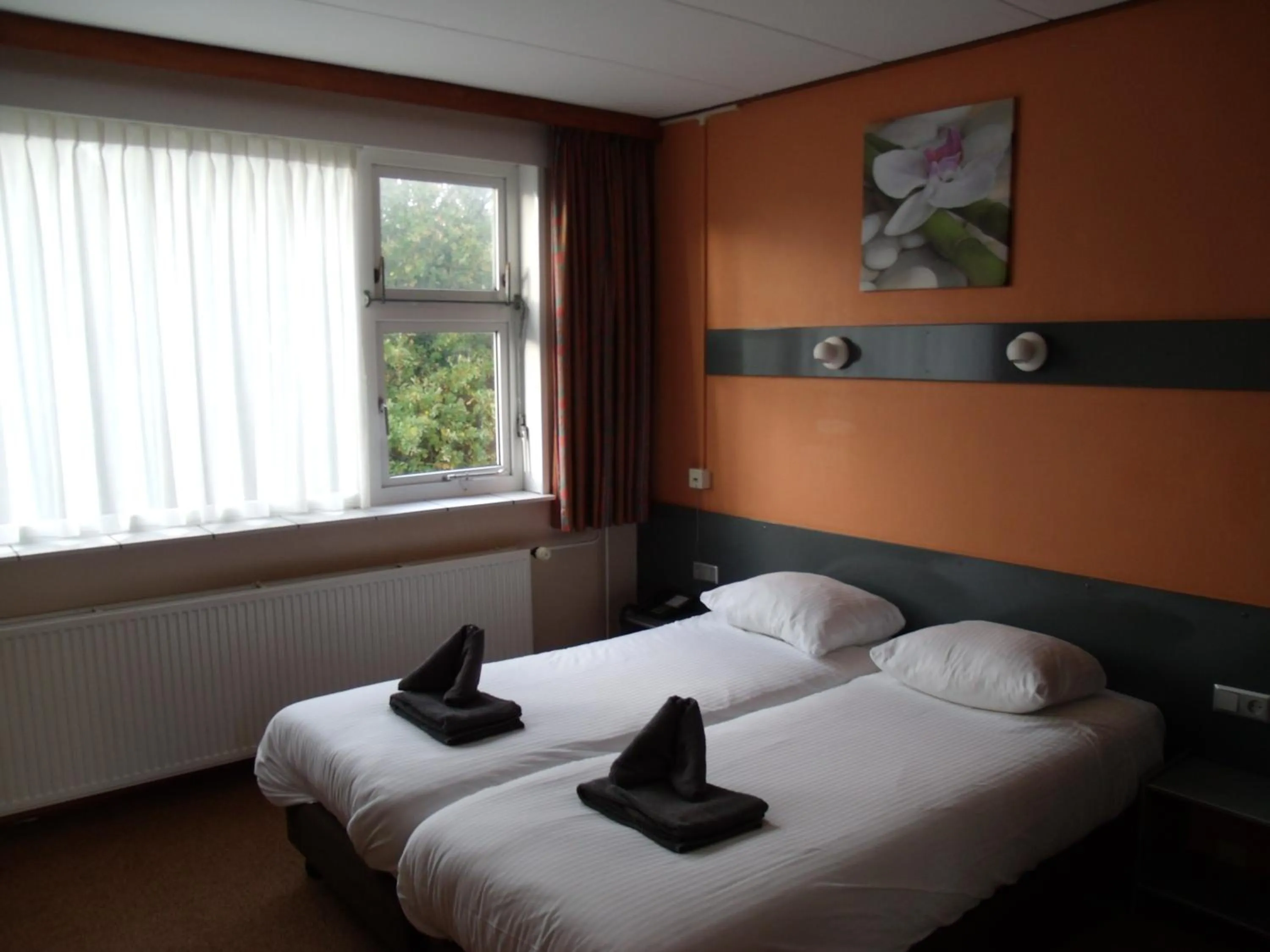 Photo of the whole room, Bed in Zorn Hotel Duinlust