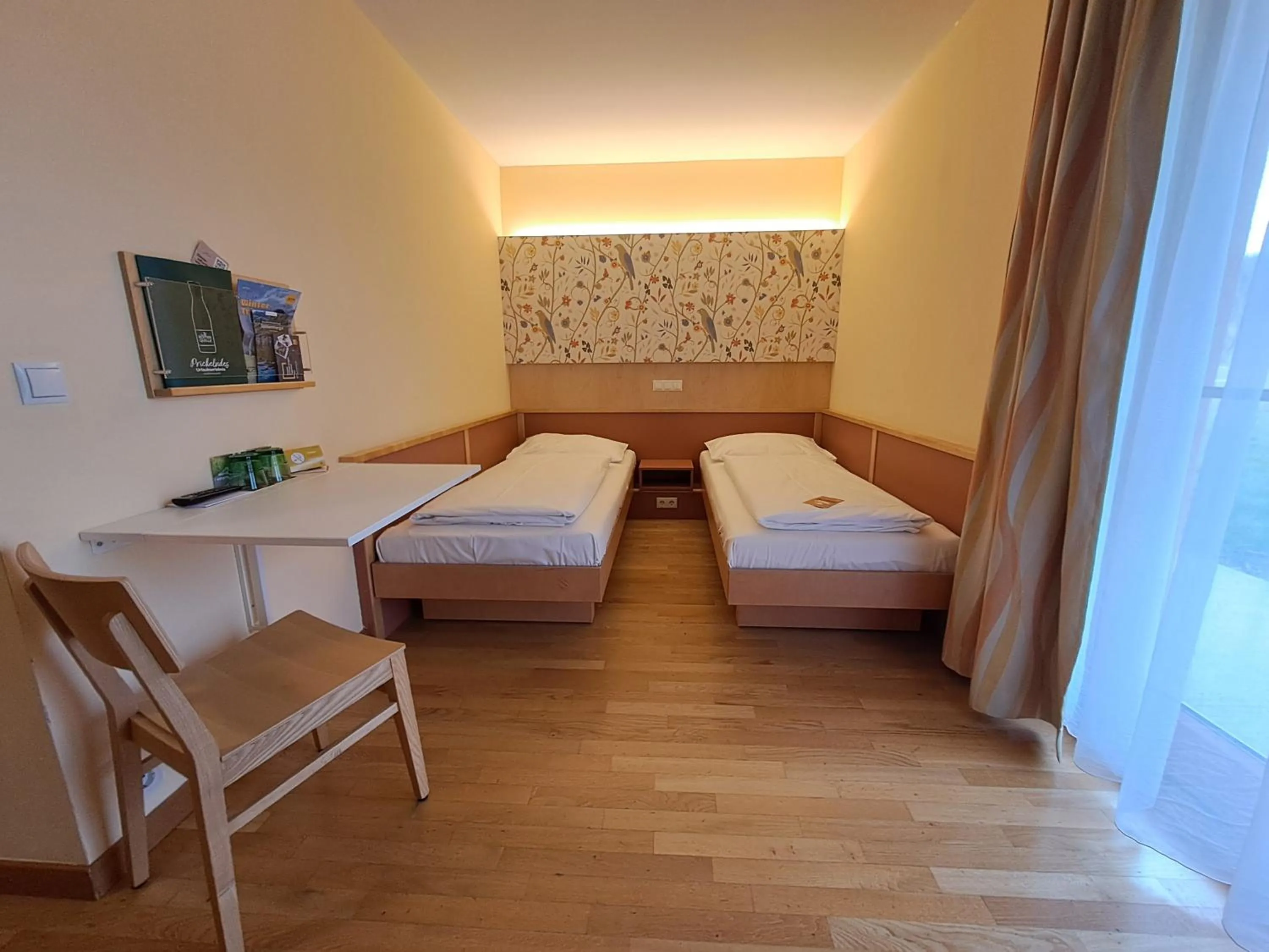 Photo of the whole room, Bed in JUFA Hotel Stubenbergsee