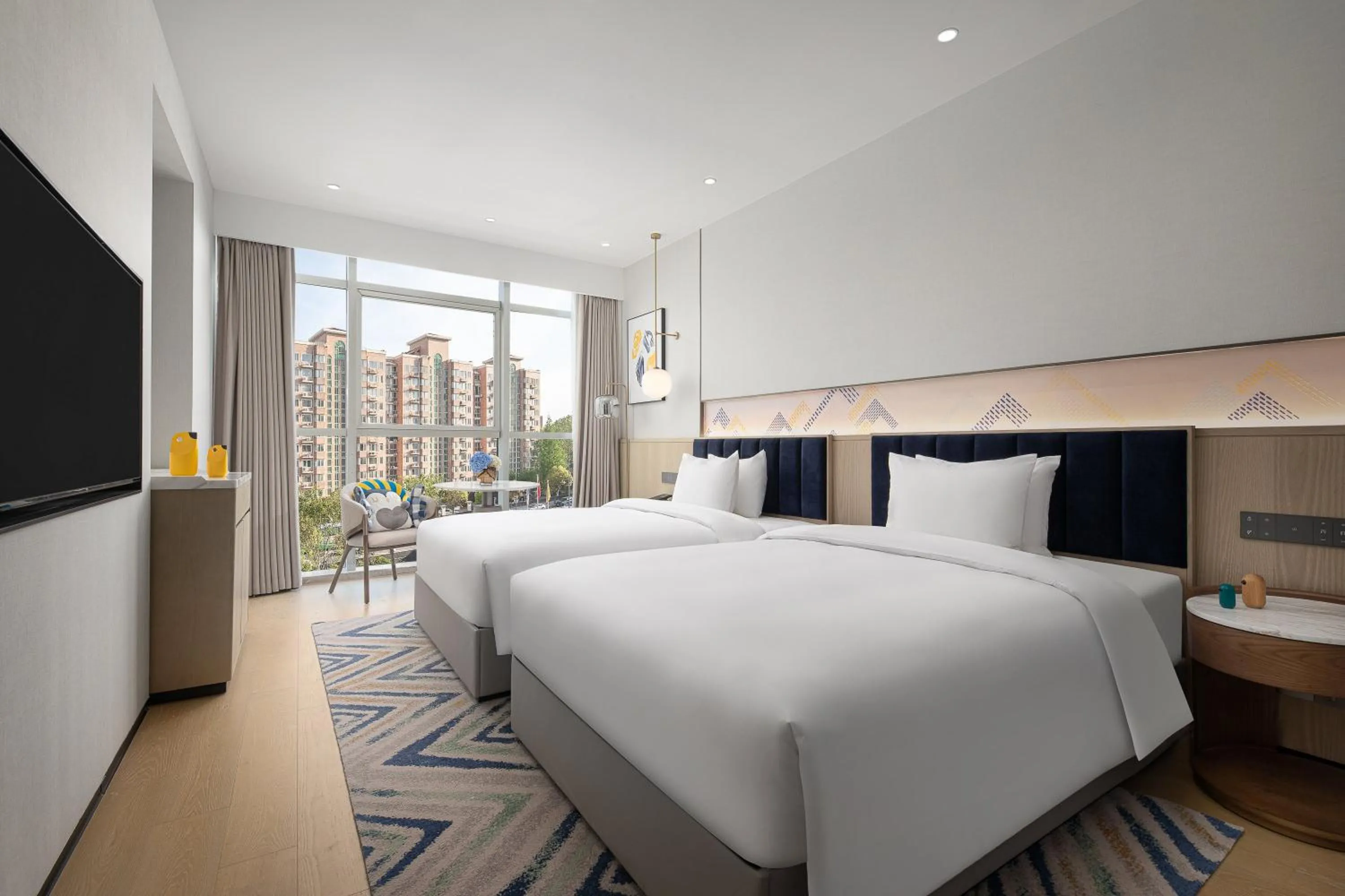 Photo of the whole room, Bed in voco Lianyungang Haizhou Bay by IHG