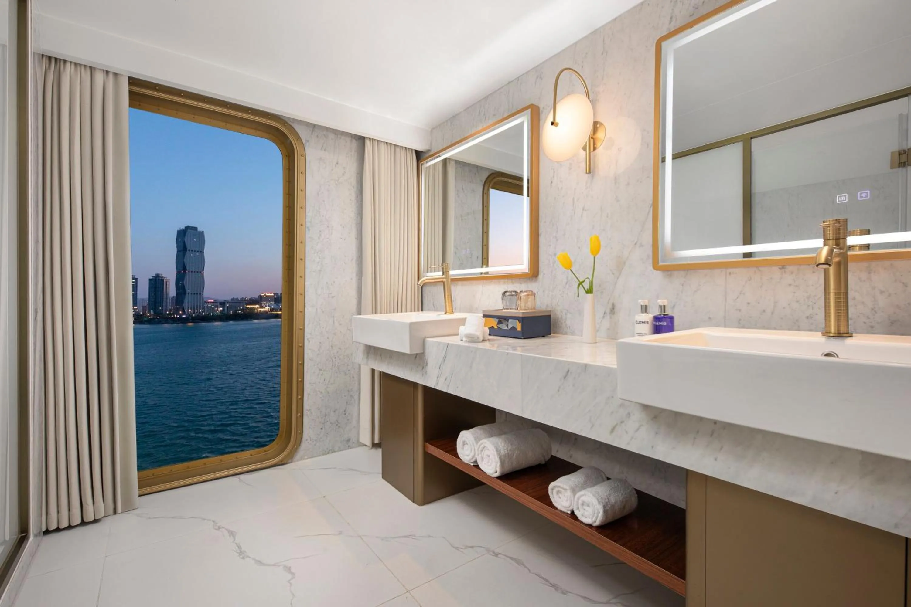 Bathroom in voco Lianyungang Haizhou Bay by IHG