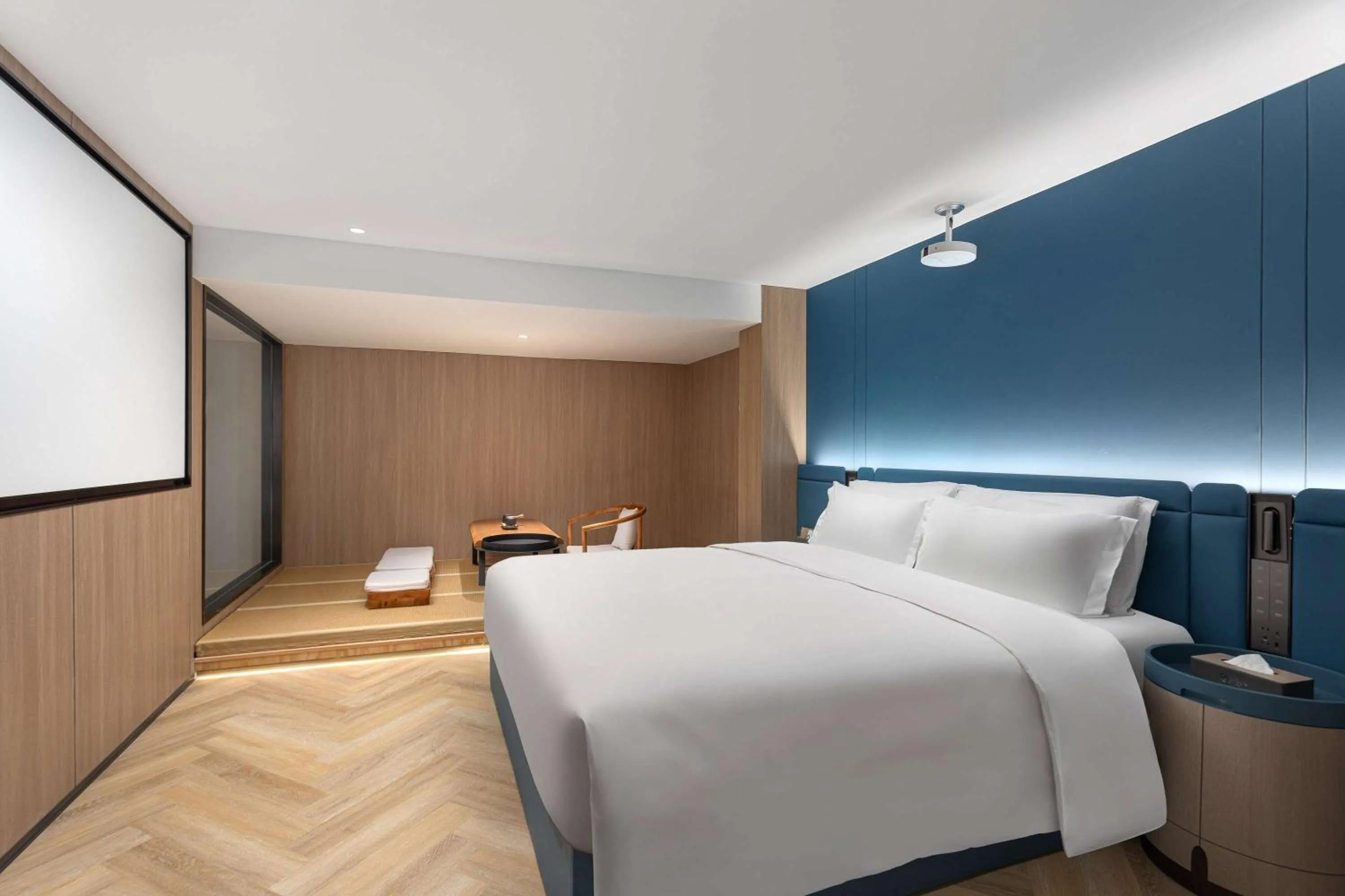 Photo of the whole room in Ramada Encore by Wyndham Wuhan Int'l Conference Center