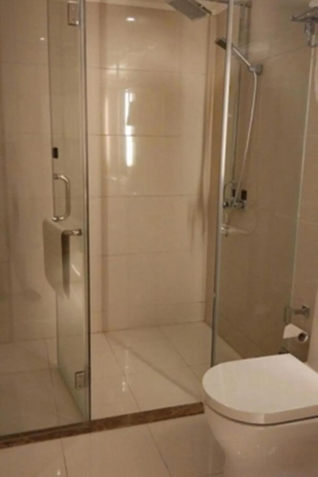 Shower in Ramada Encore by Wyndham Wuhan Int'l Conference Center