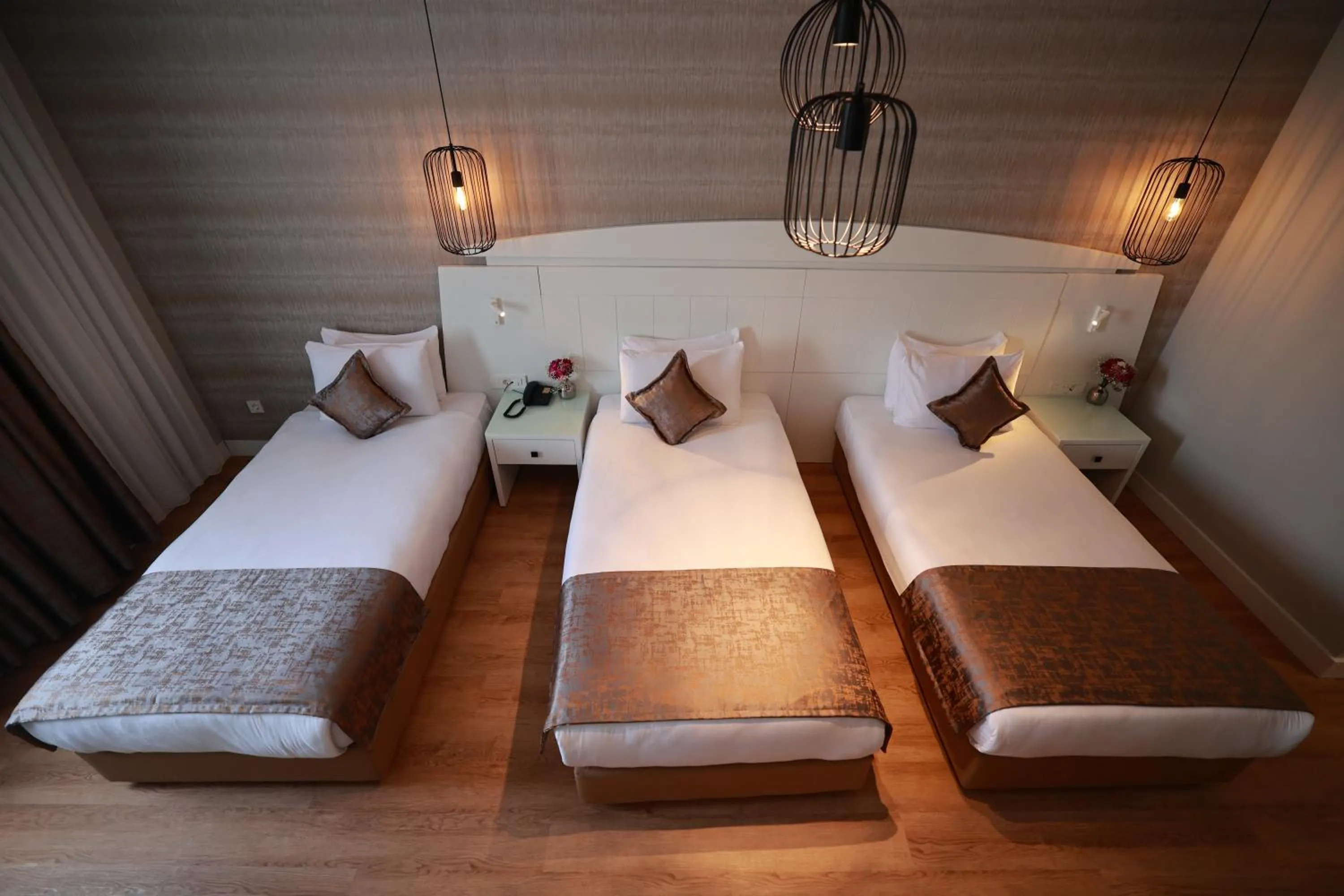 Bed in Nova Plaza Orion Hotel