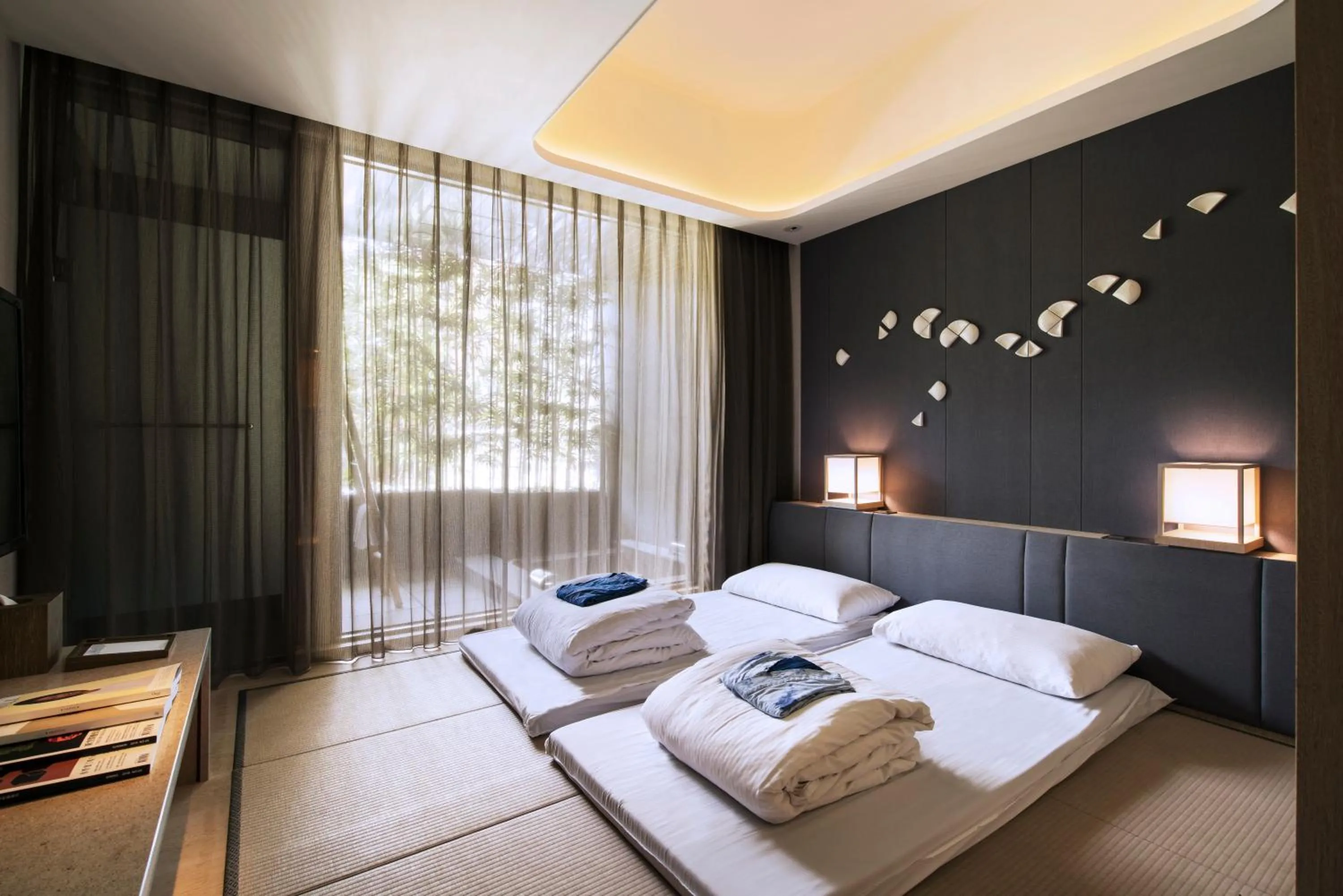 Bed in 礁溪晶泉丰旅 Wellspring by Silks Jiaoxi