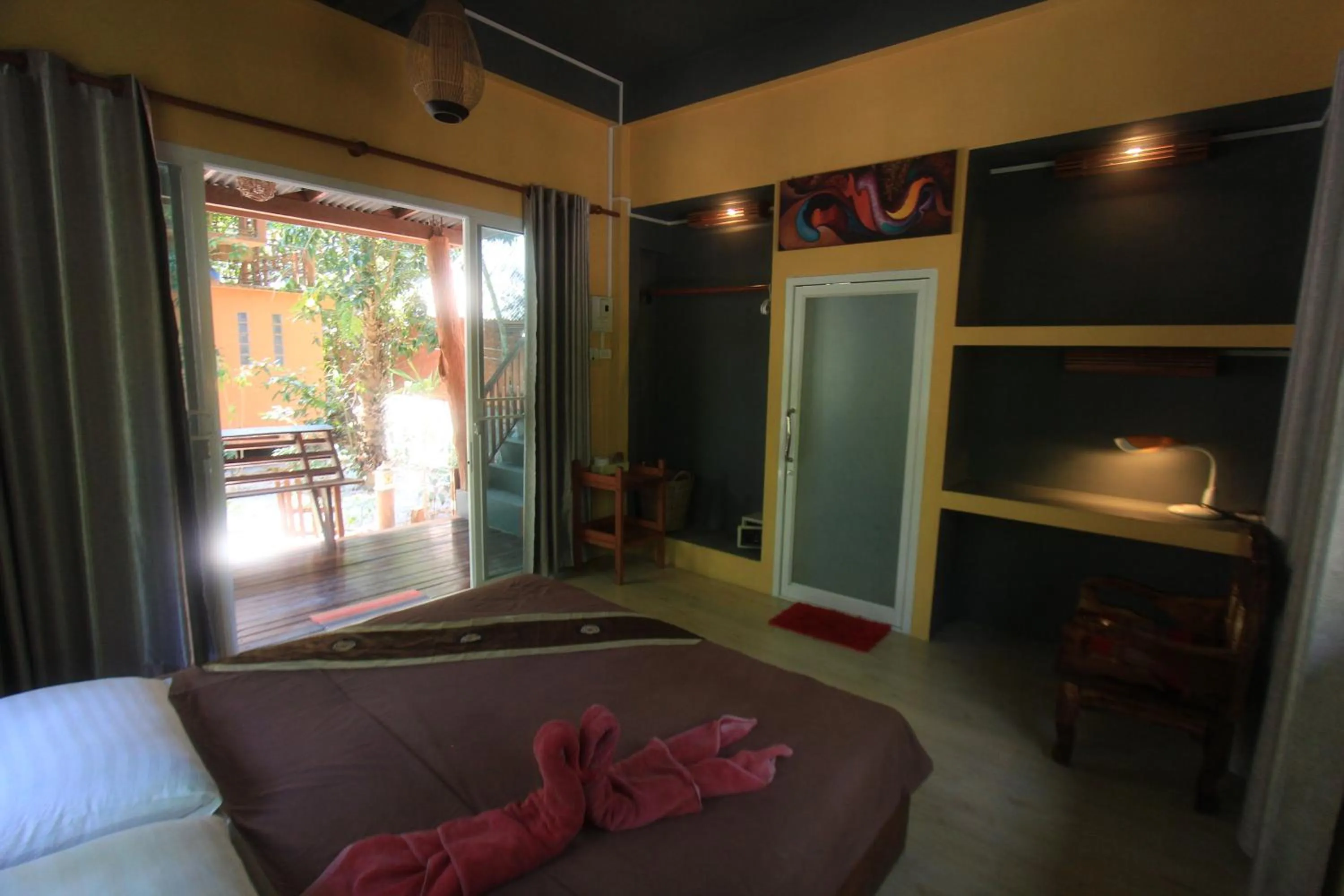 Bed in JJ Beach Resort & JJ Seafood