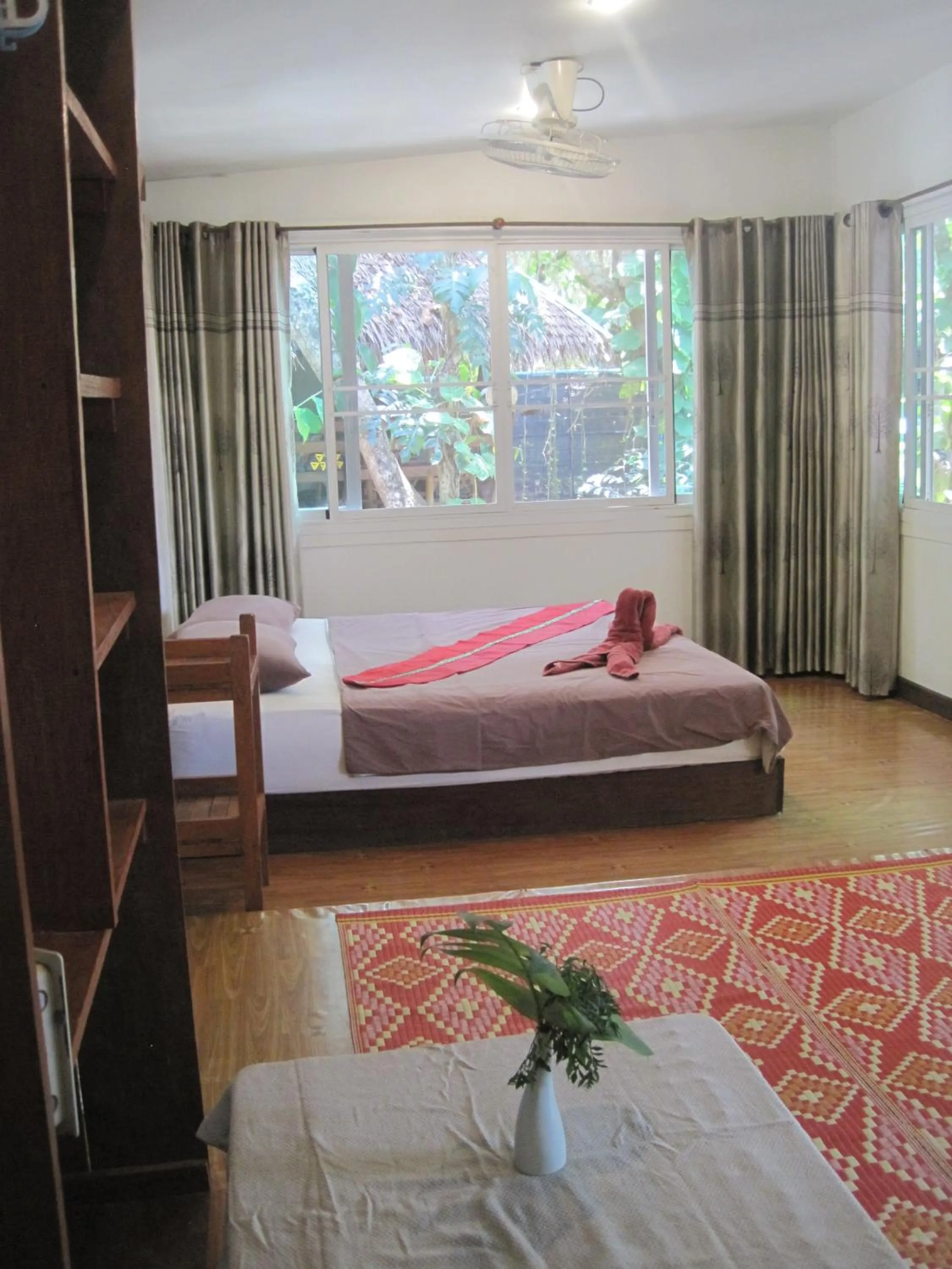 Bed in JJ Beach Resort & JJ Seafood