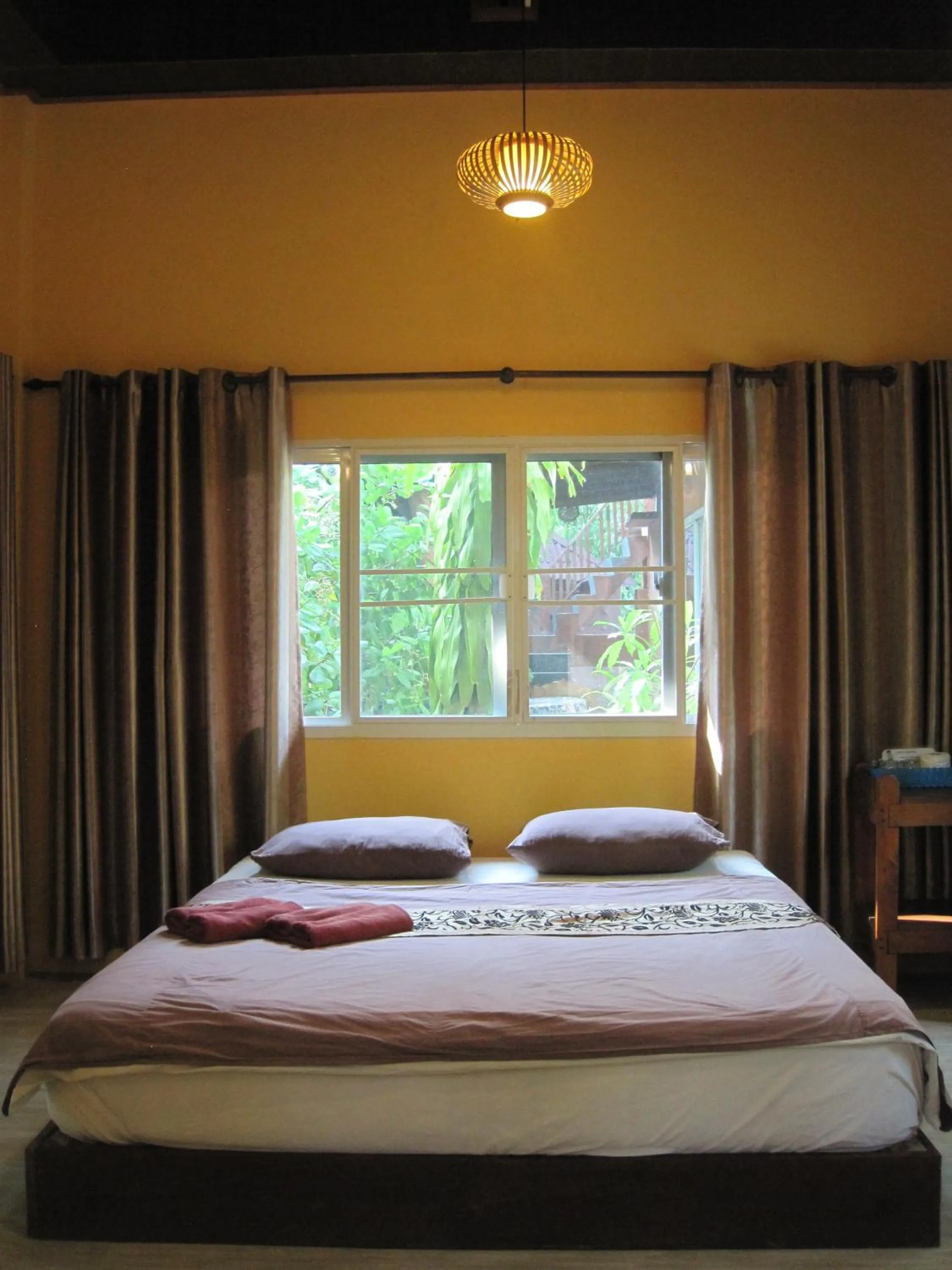 Bed in JJ Beach Resort & JJ Seafood