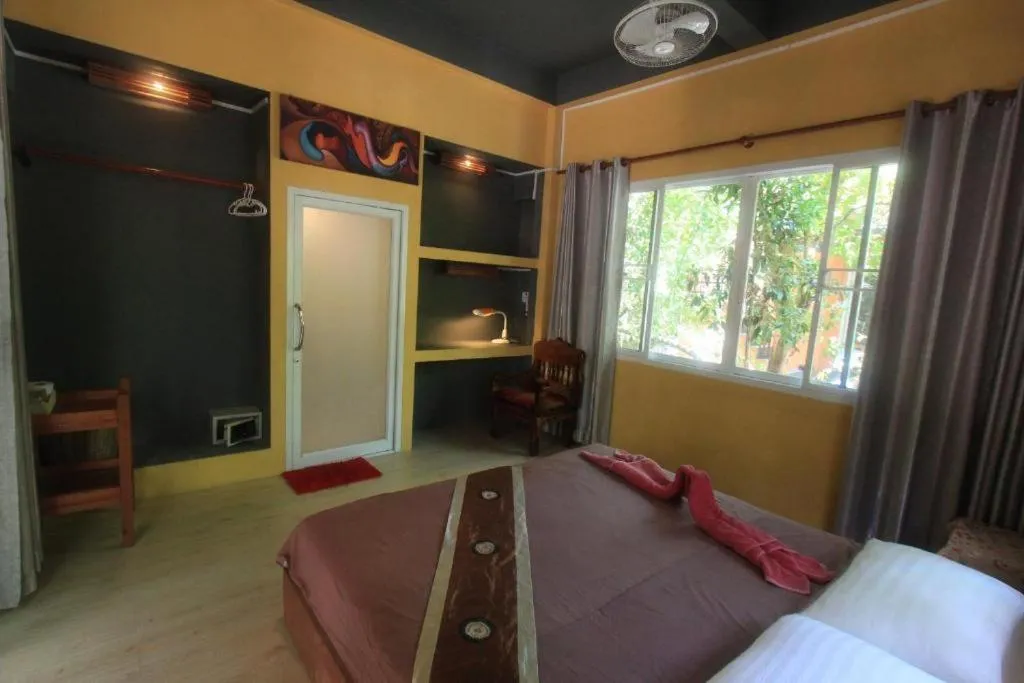 Bed in JJ Beach Resort & JJ Seafood