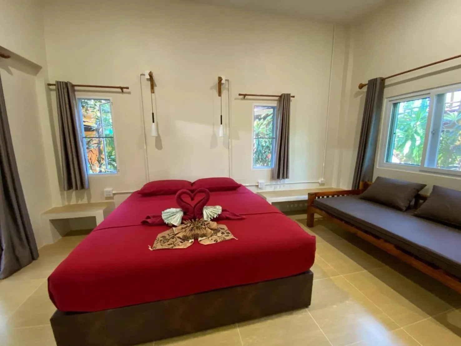 Bed in JJ Beach Resort & JJ Seafood