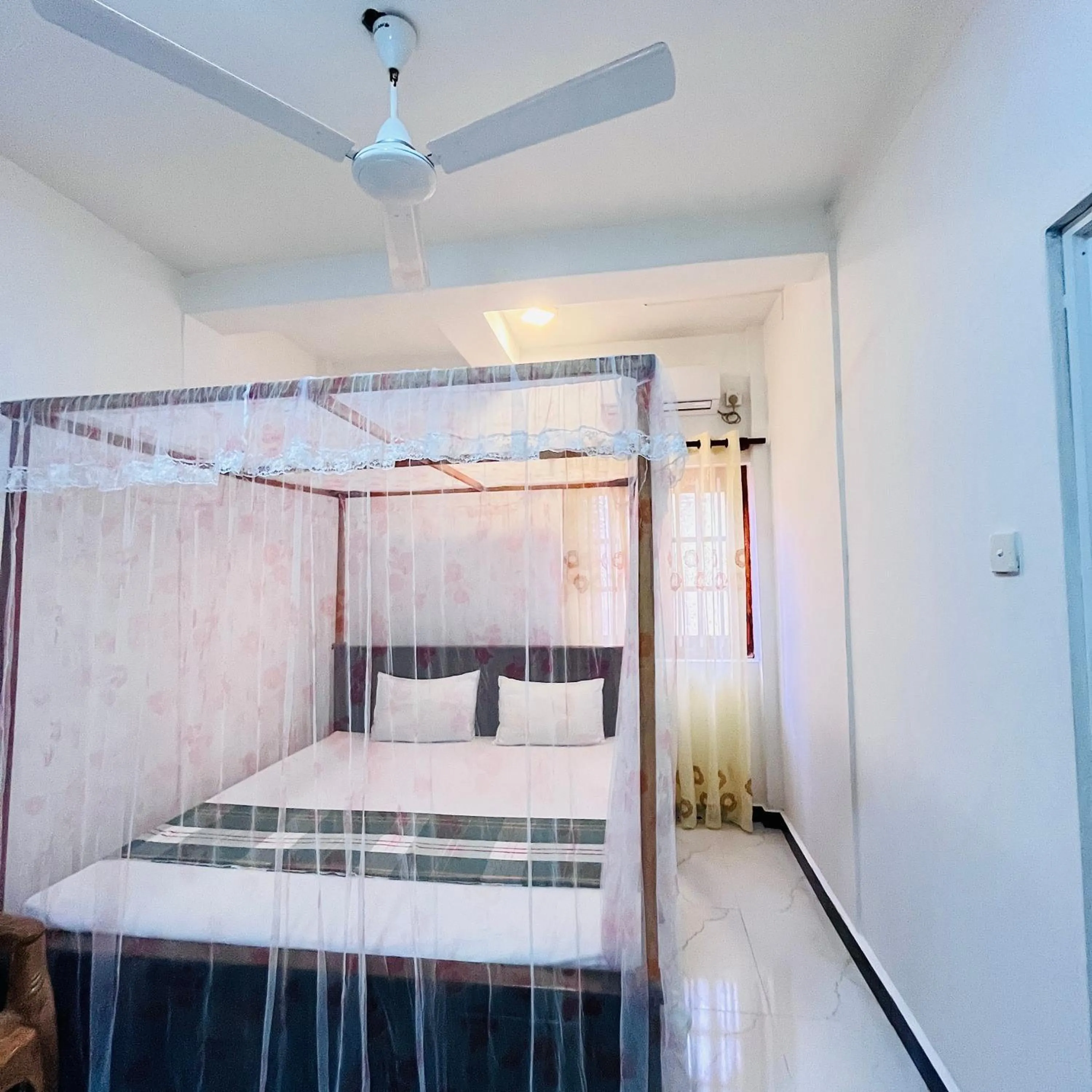 Bed in Wasana Ocean View Villa Mirissa