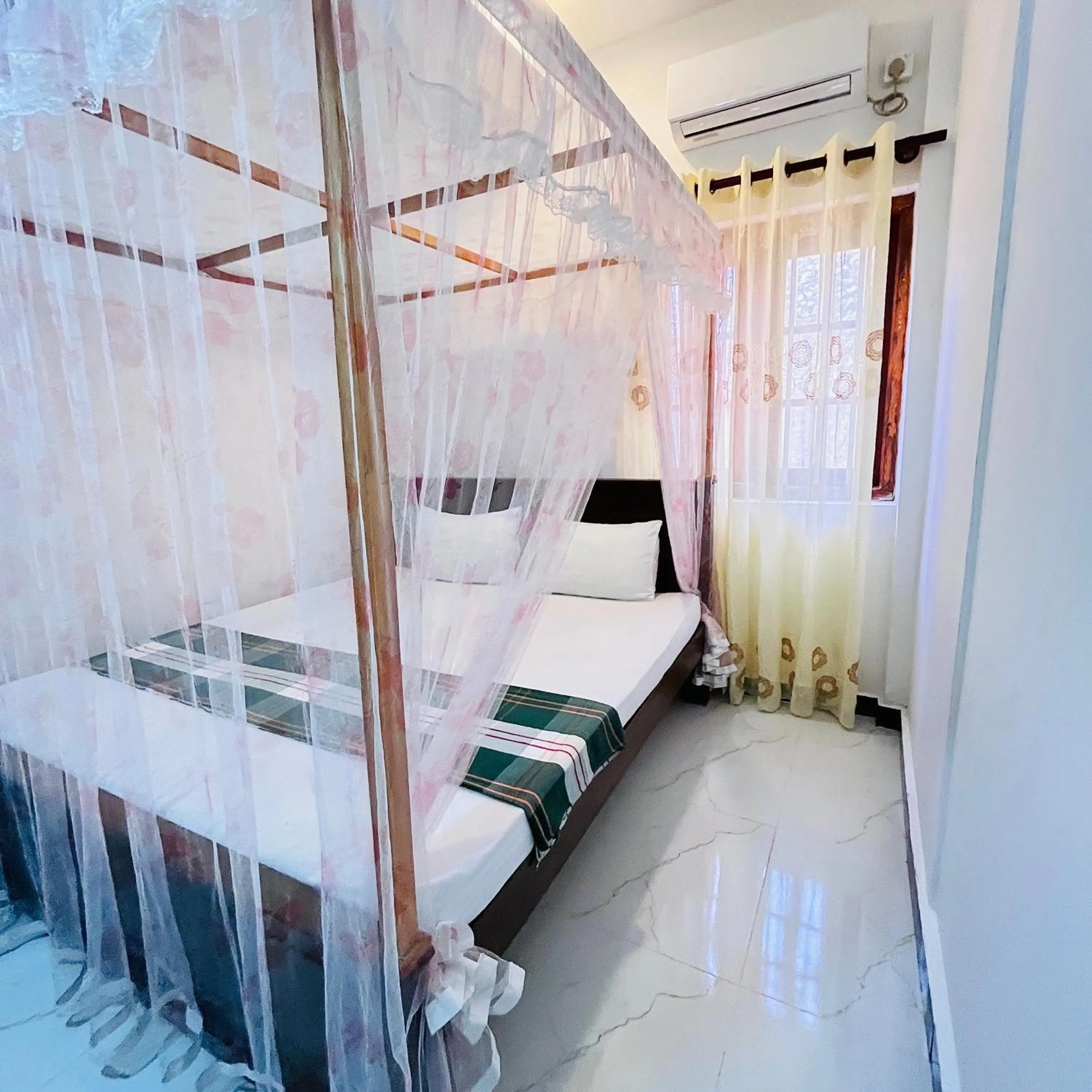 Bed in Wasana Ocean View Villa Mirissa