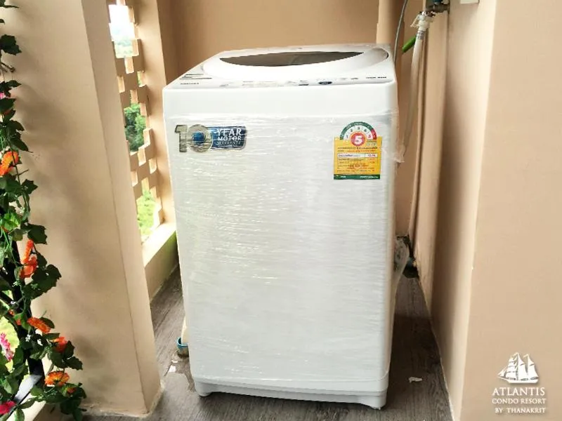 Text overlay in Atlantis Condo & Water Park Pattaya By the Sea