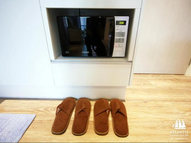 Text overlay in Atlantis Condo & Water Park Pattaya By the Sea