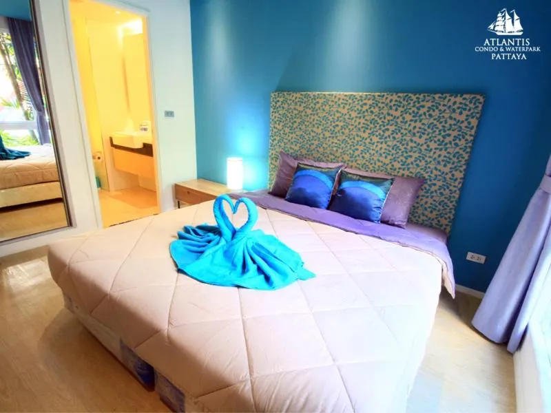 Text overlay, Bed in Atlantis Condo & Water Park Pattaya By the Sea