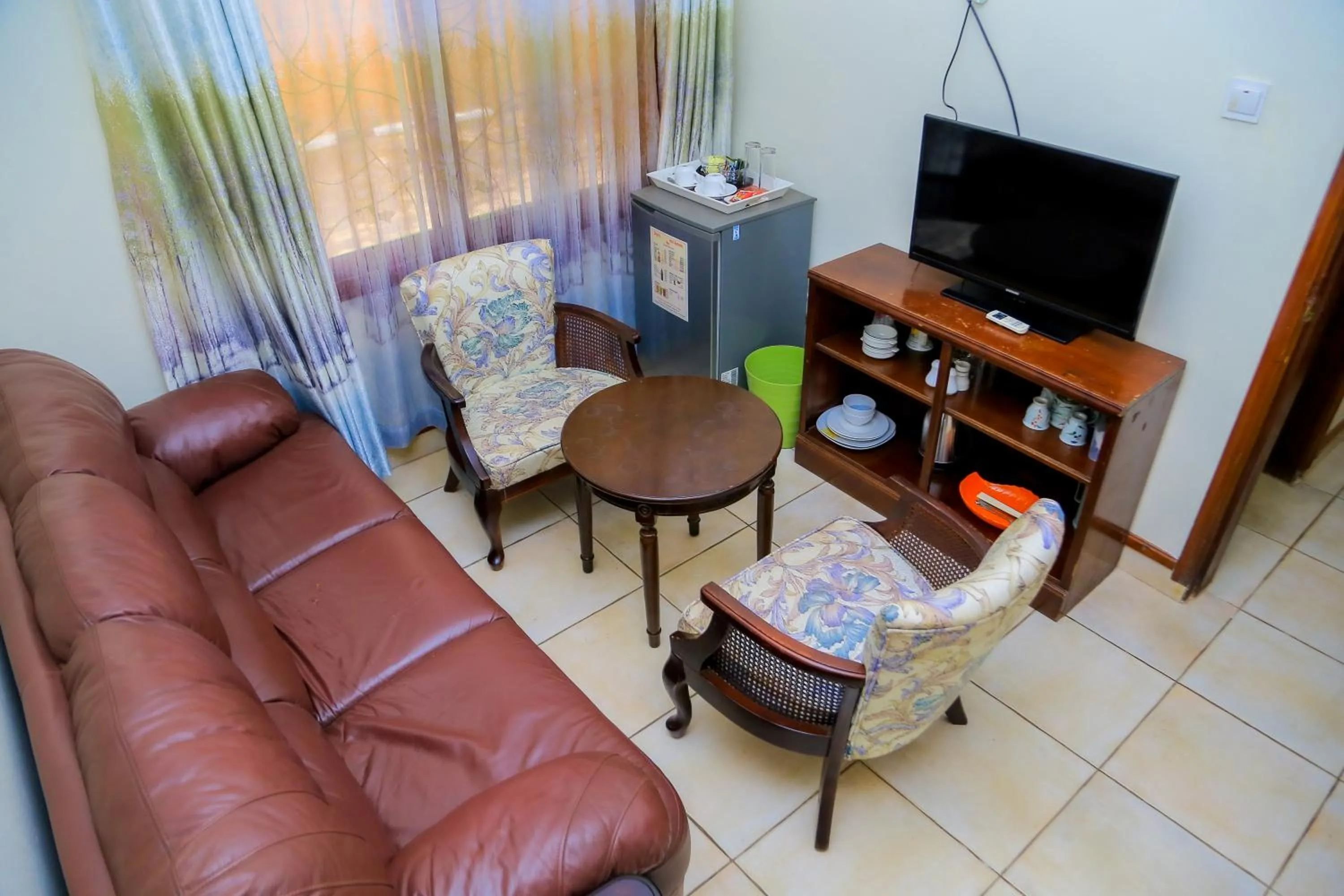 Living room in Shangri-la Hotel Muyenga