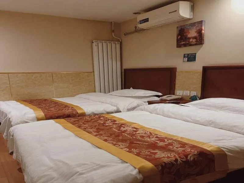 Bed in GreenTree Inn Beijing Shunyi Xinguozhan Express Hotel