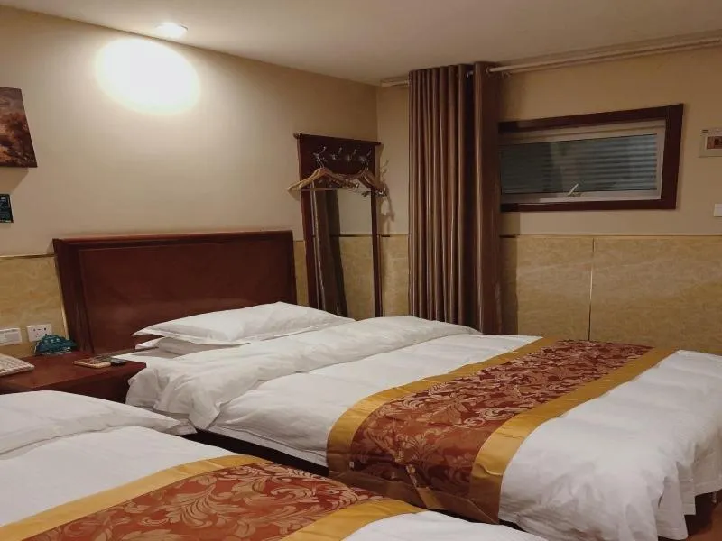 Bed in GreenTree Inn Beijing Shunyi Xinguozhan Express Hotel