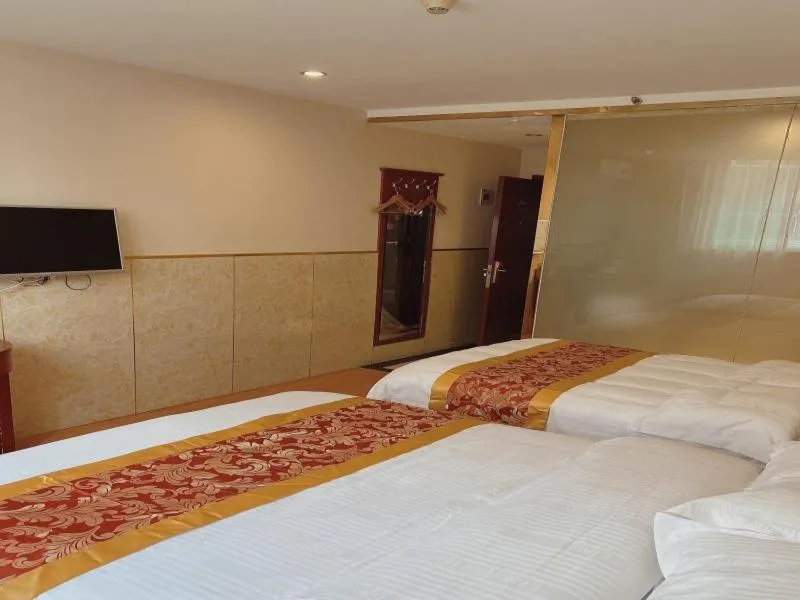 Bed in GreenTree Inn Beijing Shunyi Xinguozhan Express Hotel