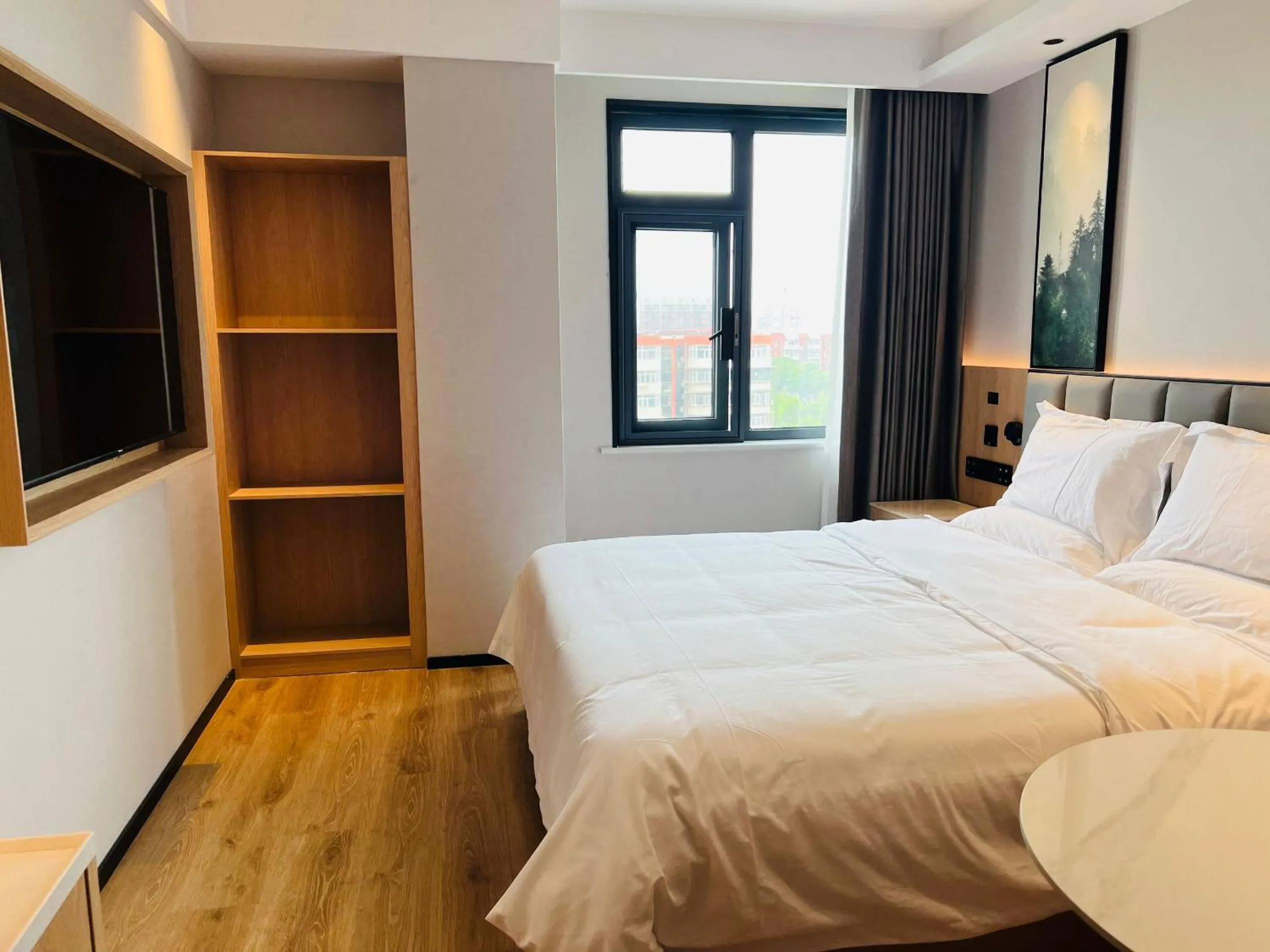 Bed in GreenTree Inn Beijing Shunyi South Shiyuan Street Express Hotel