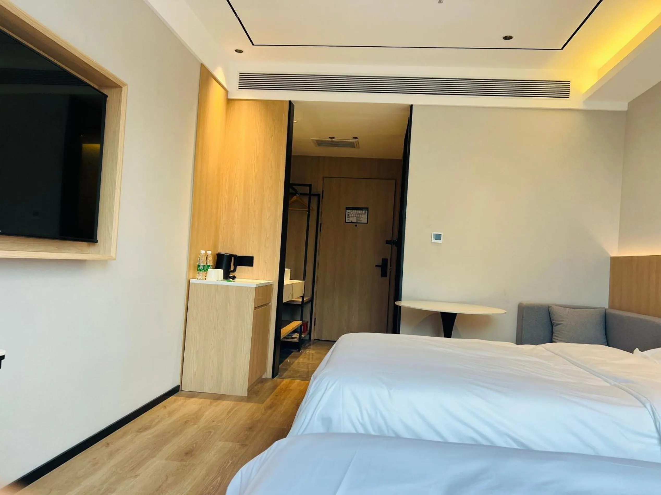 Bed in GreenTree Inn Beijing Shunyi South Shiyuan Street Express Hotel