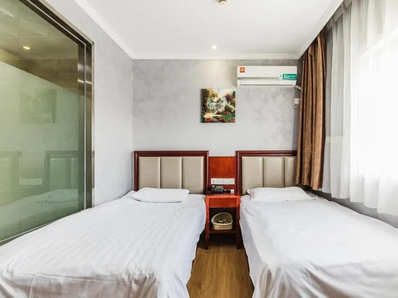 Bed in GreenTree Inn Shanghai Huinan Jinghai Road Express Hotel