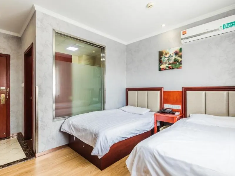 Bed in GreenTree Inn Shanghai Huinan Jinghai Road Express Hotel
