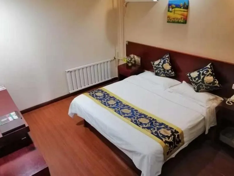 Bed in GreenTree Inn Tianjin Beiyang Bridge Business Hotel