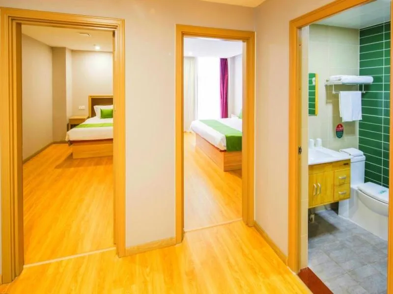 Bed in GreenTree Inn Tianjin Xiqing Development Zone Renrenle Square Express Hotel