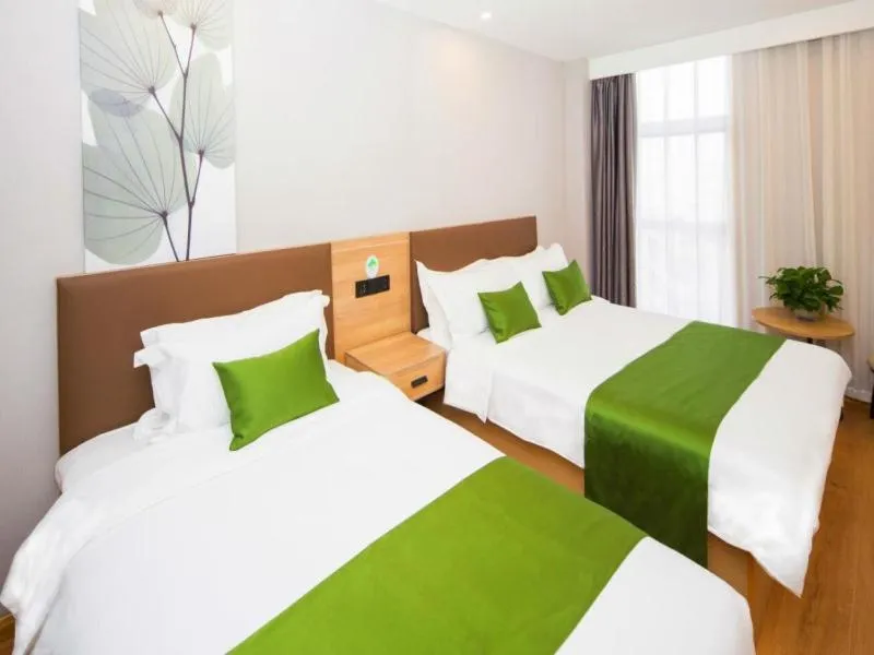 Bed in GreenTree Inn Tianjin Xiqing Development Zone Renrenle Square Express Hotel
