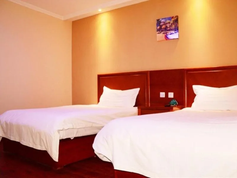 Bed in GreenTree Inn Hebei Tangshan Caofeidian Economic Development Zone Municipal Building Express Hotel