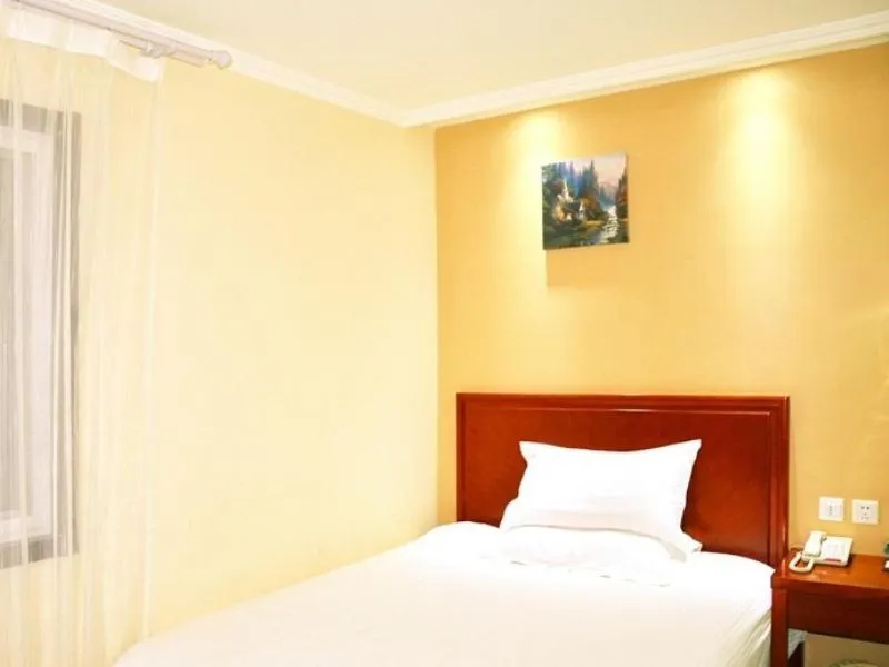 Bed in GreenTree Inn Hebei Tangshan Caofeidian Economic Development Zone Municipal Building Express Hotel
