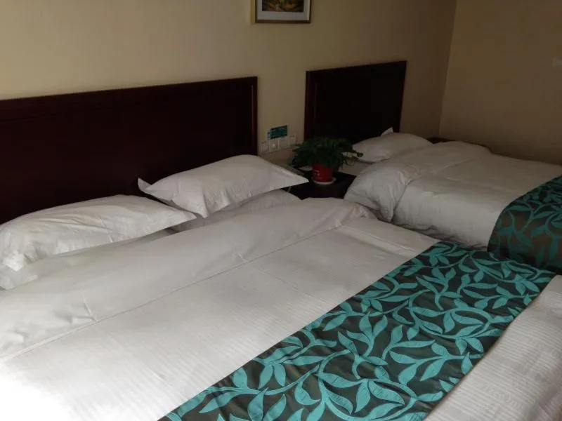 Bed in GreenTree Inn Shandong Zibo Railway Station Jinjing Avenue Business Hotel