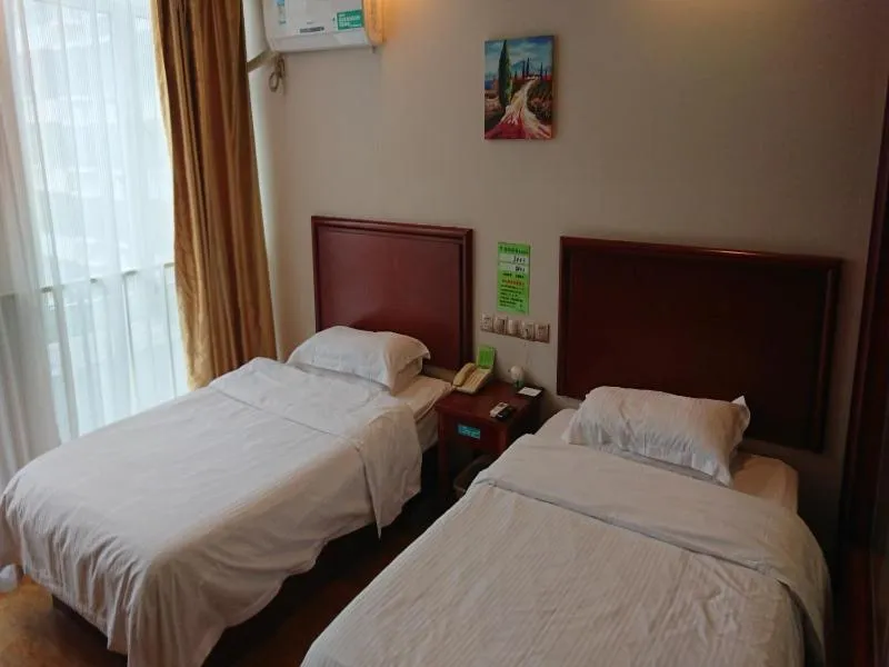 Bed in GreenTree Inn Shandong Jining Jinxiang Kuixing Road Express Hotel