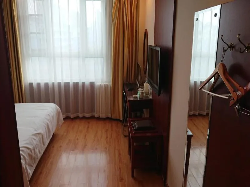 Bed in GreenTree Inn Shandong Jining Jinxiang Kuixing Road Express Hotel