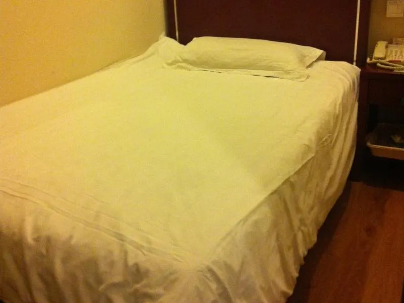 Bed in GreenTree Inn Shandong Binzhou Wanda Plaza Huangheshilu Express Hotel