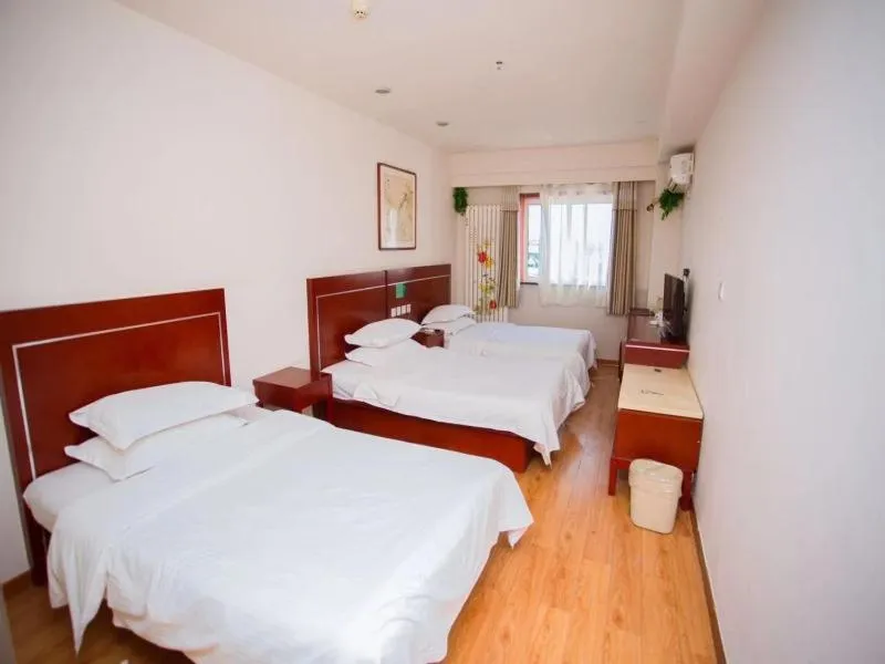 Bed in GreenTree Inn Shandong Binzhou Wanda Plaza Huangheshilu Express Hotel