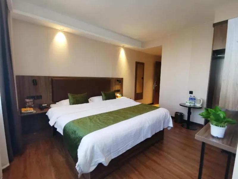 Bed in GreenTree Inn Anhui Lu’an Huoshan Yingjia Avenue Business Hotel