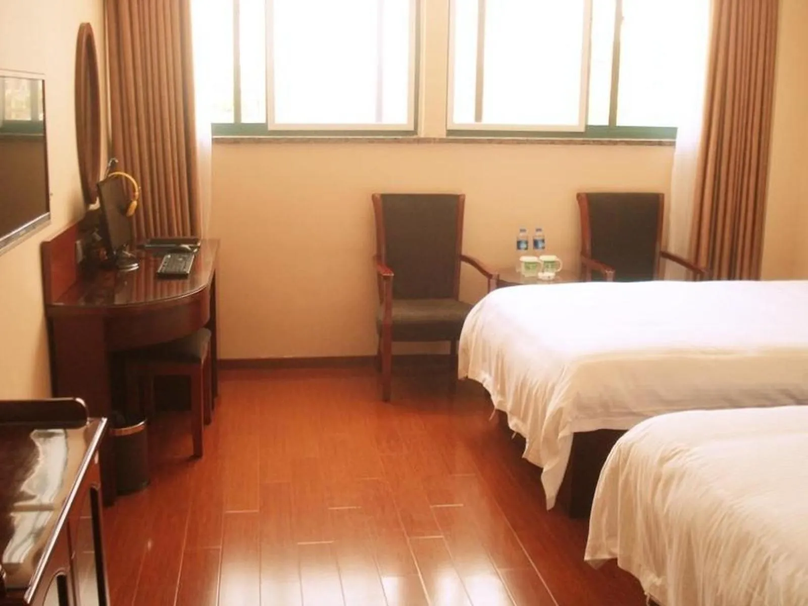 Bed in GreenTree Inn Anhui Lu’an Huoshan Yingjia Avenue Business Hotel