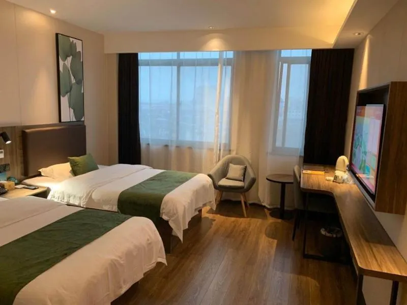 Bed in GreenTree Inn Anhui Lu’an Huoshan Yingjia Avenue Business Hotel