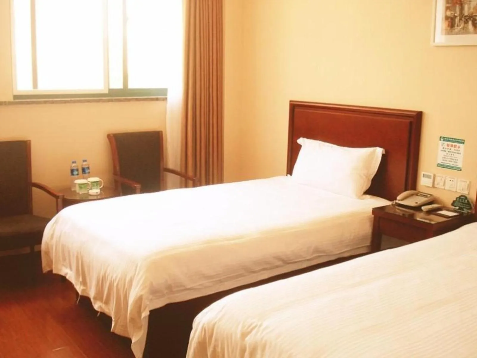 Bed in GreenTree Inn Anhui Lu’an Huoshan Yingjia Avenue Business Hotel