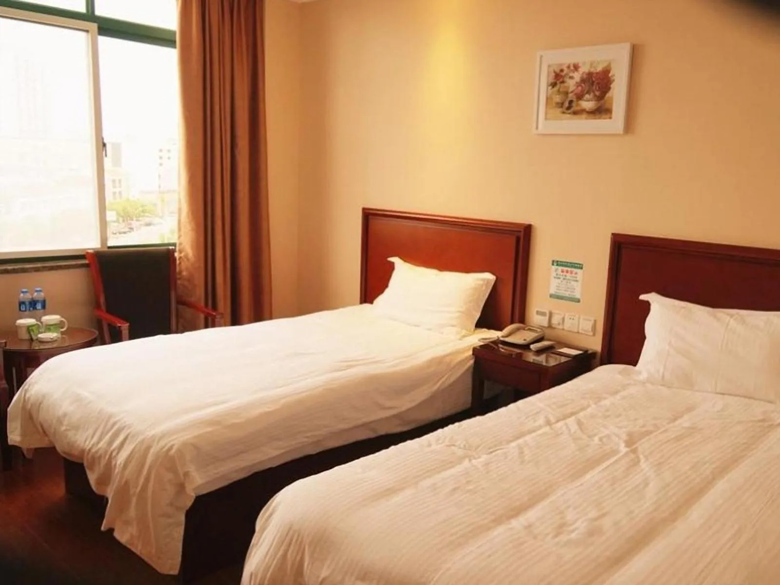 Bed in GreenTree Inn Anhui Lu’an Huoshan Yingjia Avenue Business Hotel