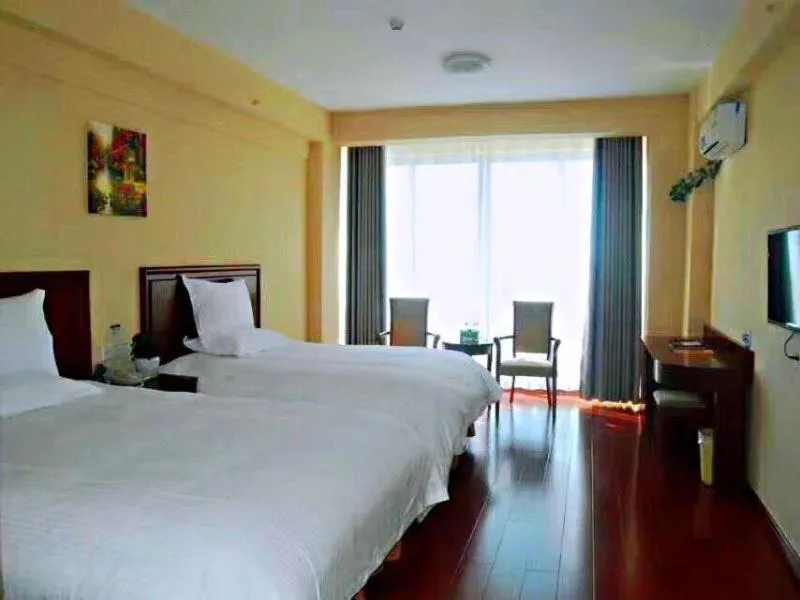 Bed in GreenTree Inn Shandong Weihai Wendeng Darunfa Business Hotel