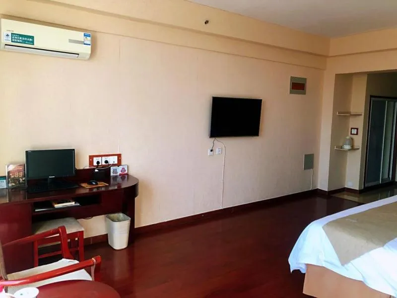 Bed in GreenTree Inn Shandong Weihai Wendeng Darunfa Business Hotel