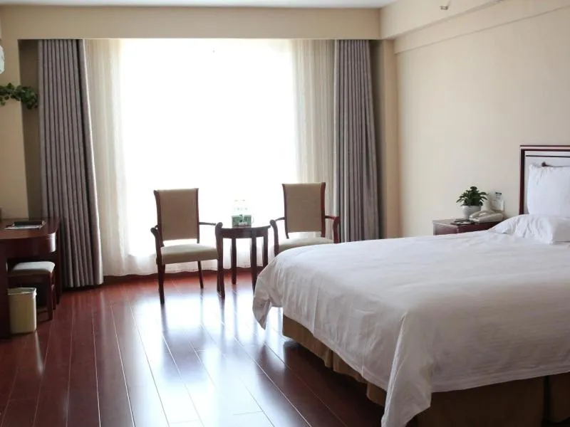 Bed in GreenTree Inn Shandong Weihai Wendeng Darunfa Business Hotel