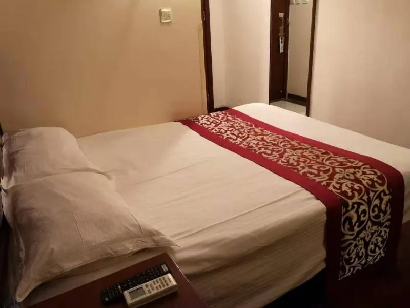 Bed in GreenTree Inn Shandong Rizhao University City Express Hotel