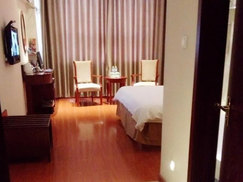 Bed in GreenTree Inn Shandong Liaocheng Chiping East Huixin Road Business Hotel