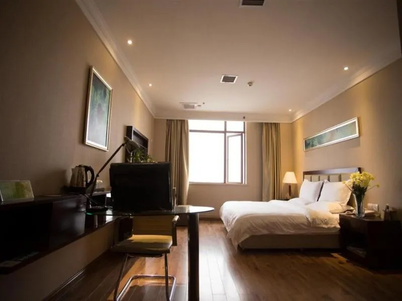 Bed in GreenTree Inn Hubei Huanggang Hong An Wal-Mart Plaza Business Hotel