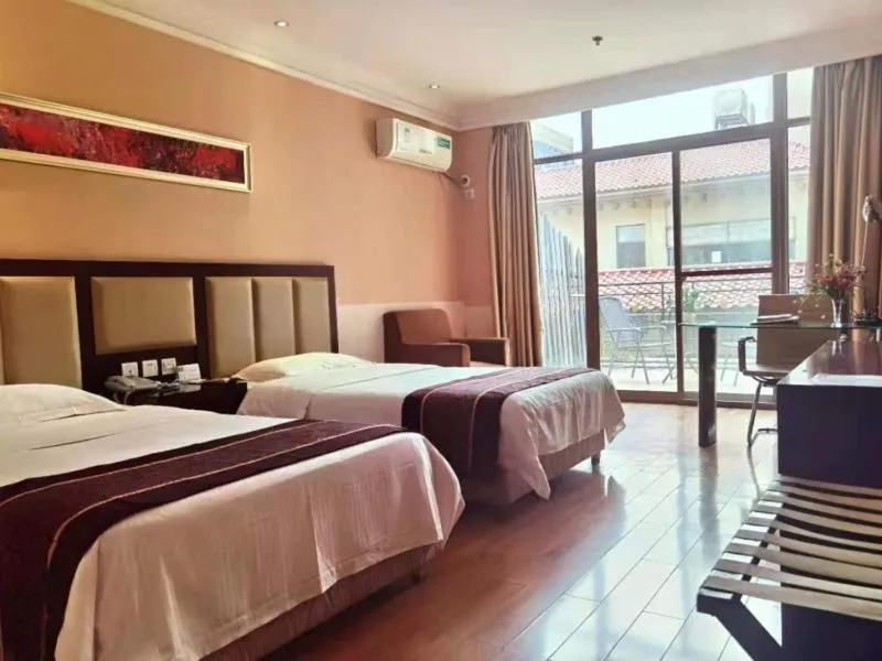 Bed in GreenTree Inn Hubei Huanggang Hong An Wal-Mart Plaza Business Hotel