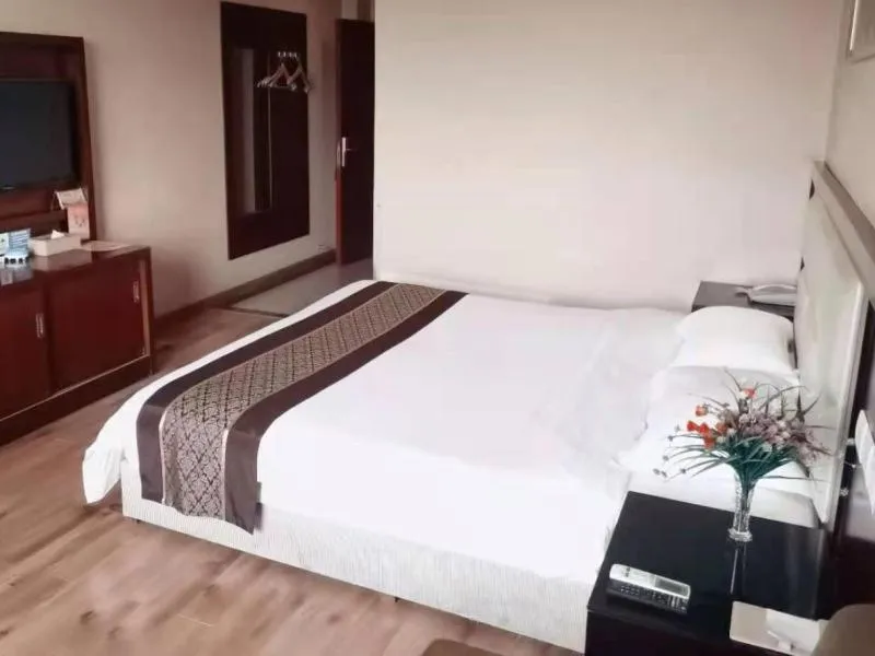 Bed in GreenTree Inn Hubei Huanggang Hong An Wal-Mart Plaza Business Hotel