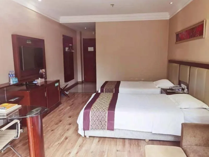 Bed in GreenTree Inn Hubei Huanggang Hong An Wal-Mart Plaza Business Hotel